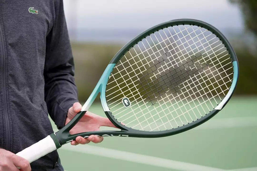 What happens if you throw your racket in tennis?